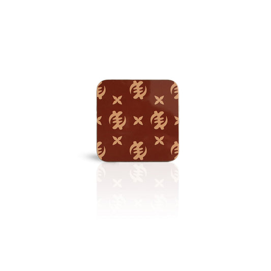 coffee coloured Nyame adinkra wooden coaster on white background.