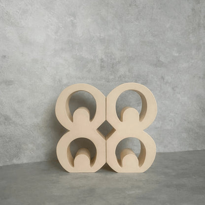 Beige Mate Masie Adinkra Bookends on grey background