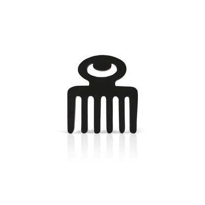 black Duafe adinkra coaster on white background.