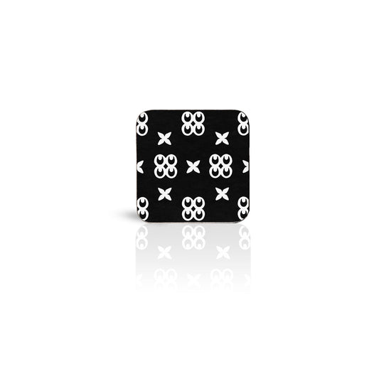black Mate Masie adinkra square wooden coaster on white background.